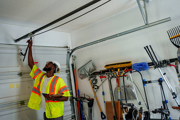 Professional Garage Door Panel Replacement technician working in Adams County County, CO